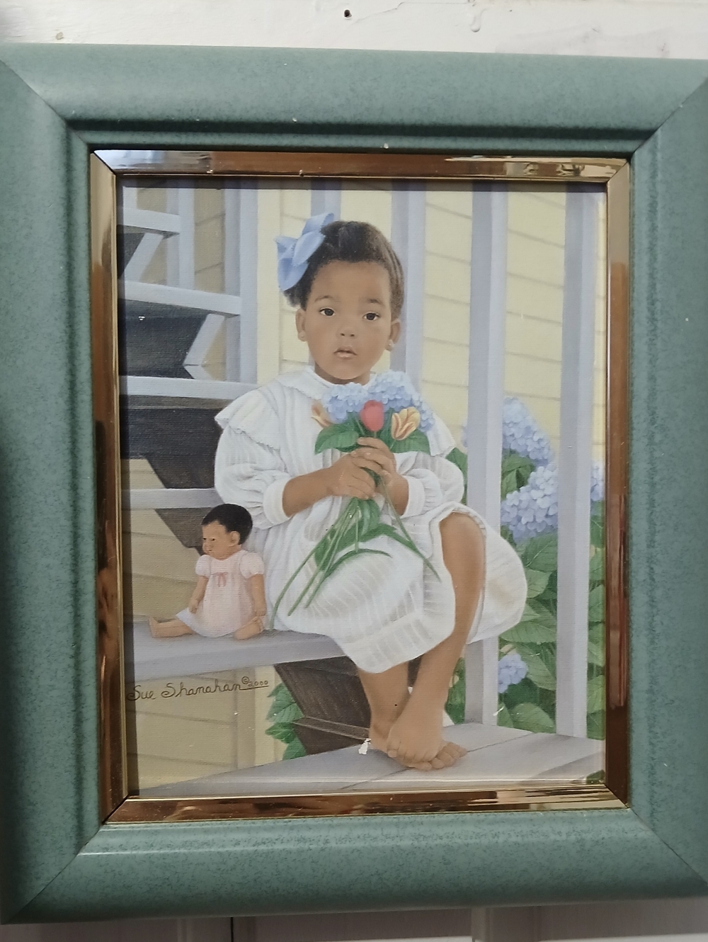 Framed Green Wall Art Print Featuring Child with Flowers